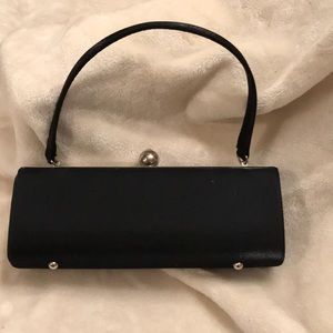 Classy Timeless Black Clutch Silver metal details.